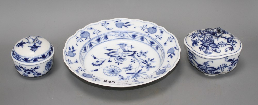 A Meissen blue and white quatrelobed bowl and cover, width 11.5cm, a circular bowl and cover, 8.5cm and a blue and white soup plate, 23